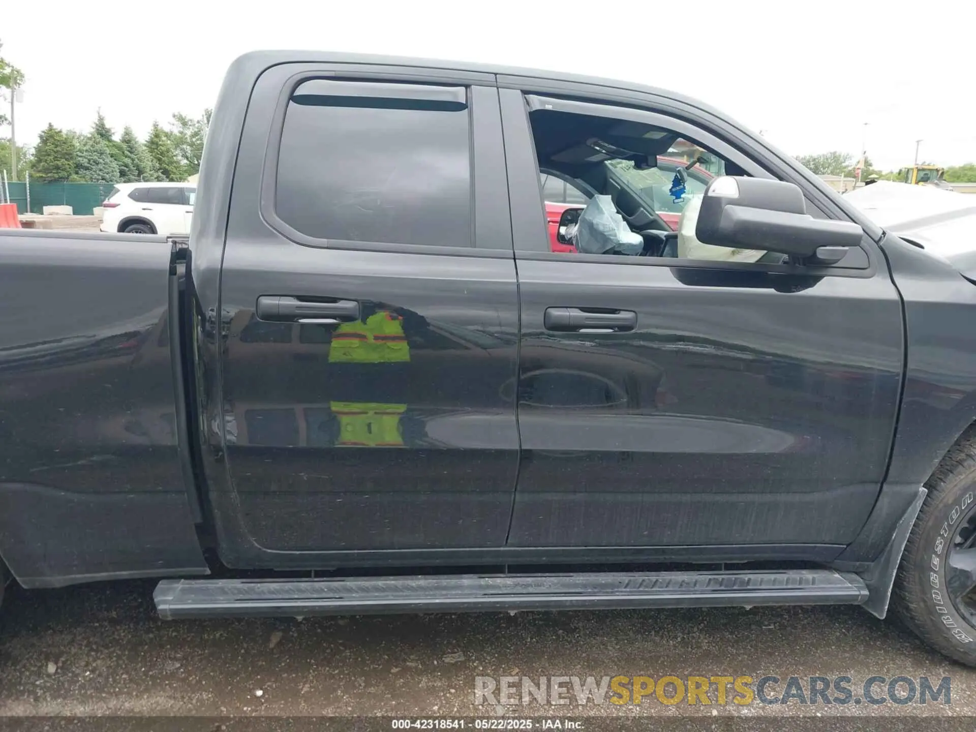 13 Photograph of a damaged car 1C6SRFCT2RN138329 RAM 1500 2024