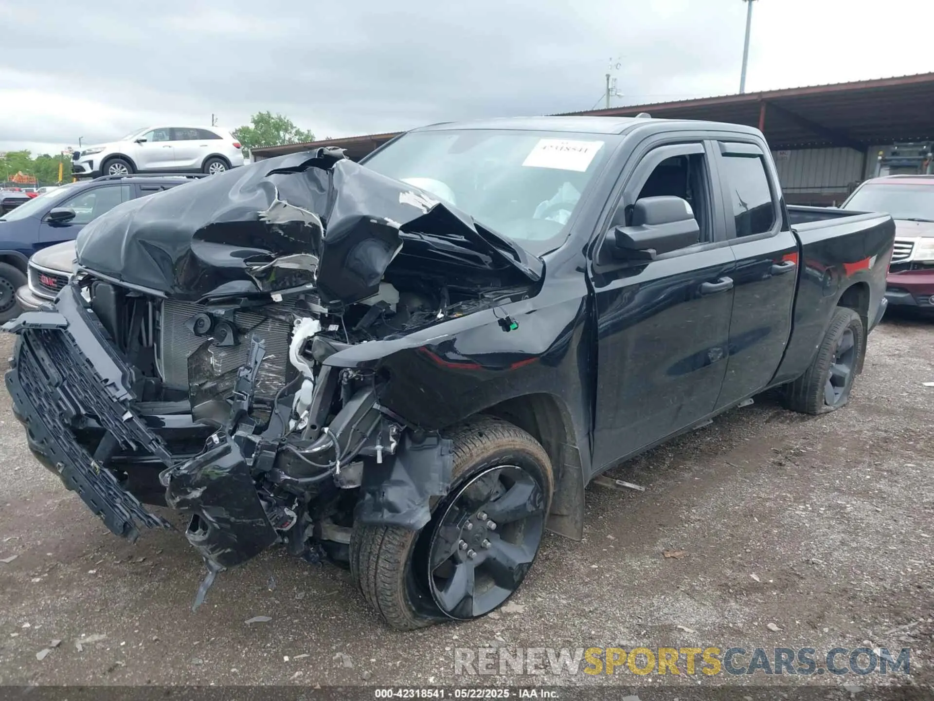 2 Photograph of a damaged car 1C6SRFCT2RN138329 RAM 1500 2024