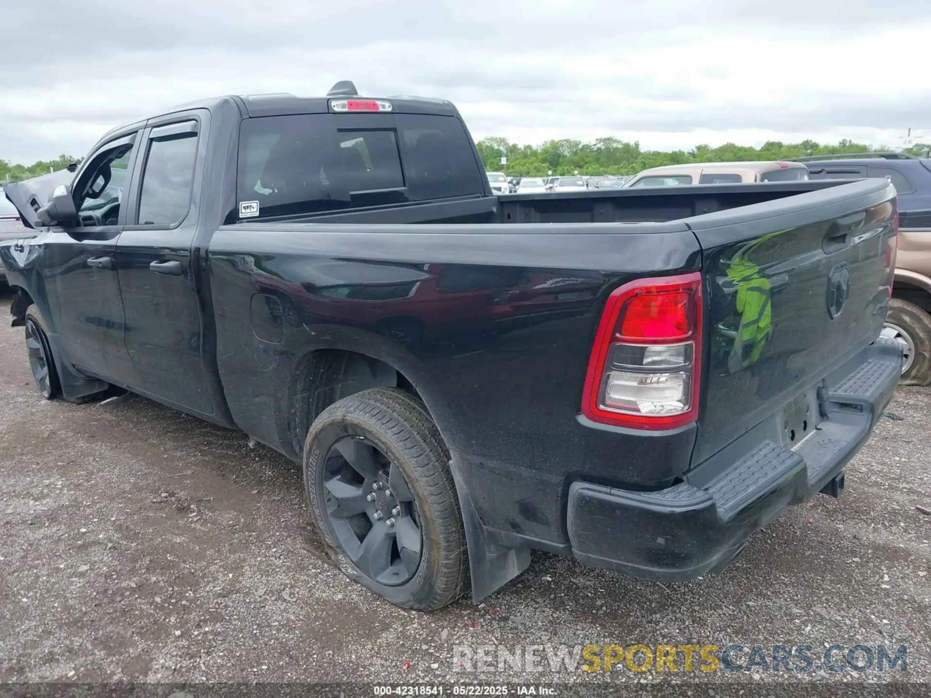 3 Photograph of a damaged car 1C6SRFCT2RN138329 RAM 1500 2024