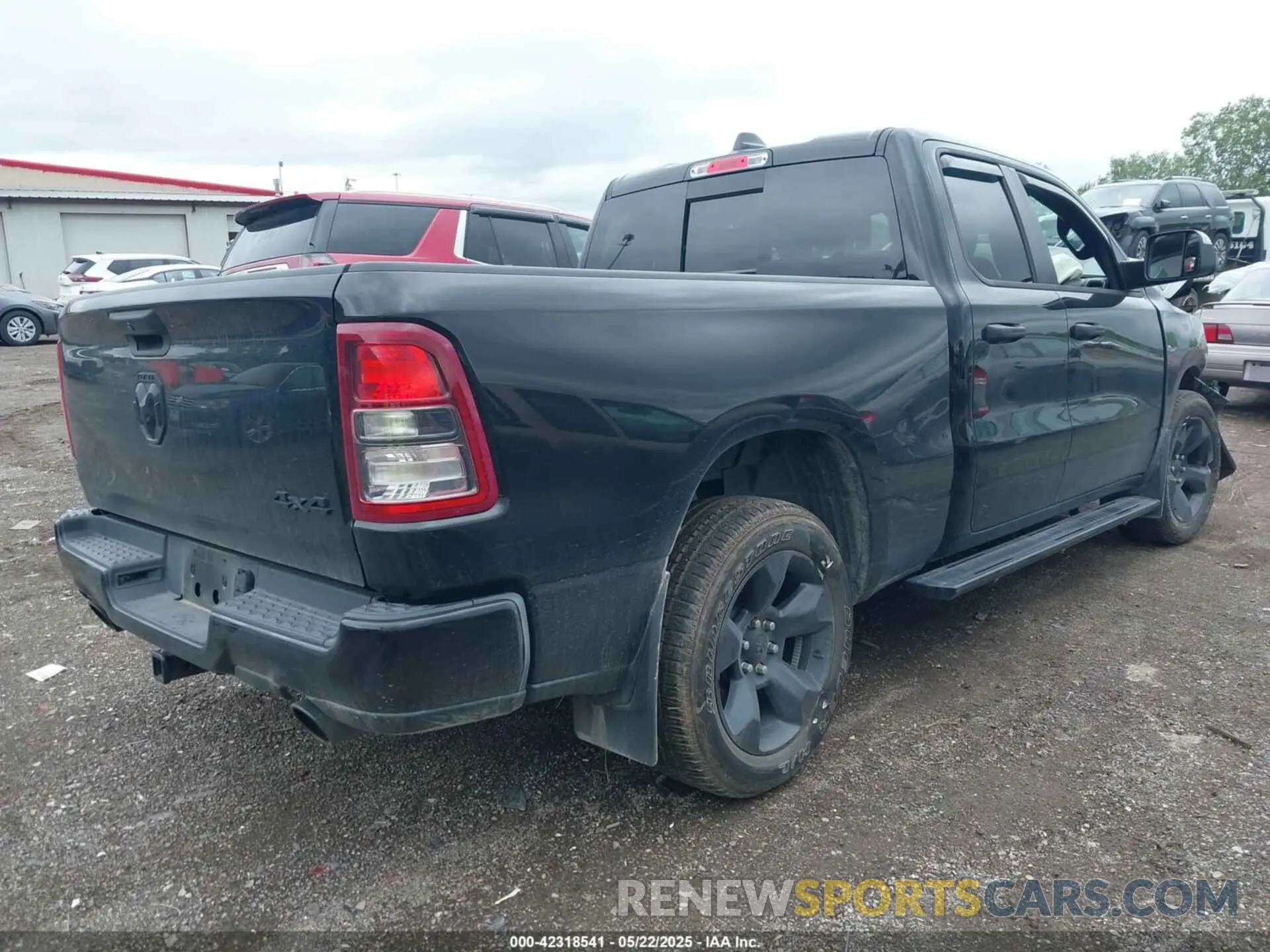 4 Photograph of a damaged car 1C6SRFCT2RN138329 RAM 1500 2024
