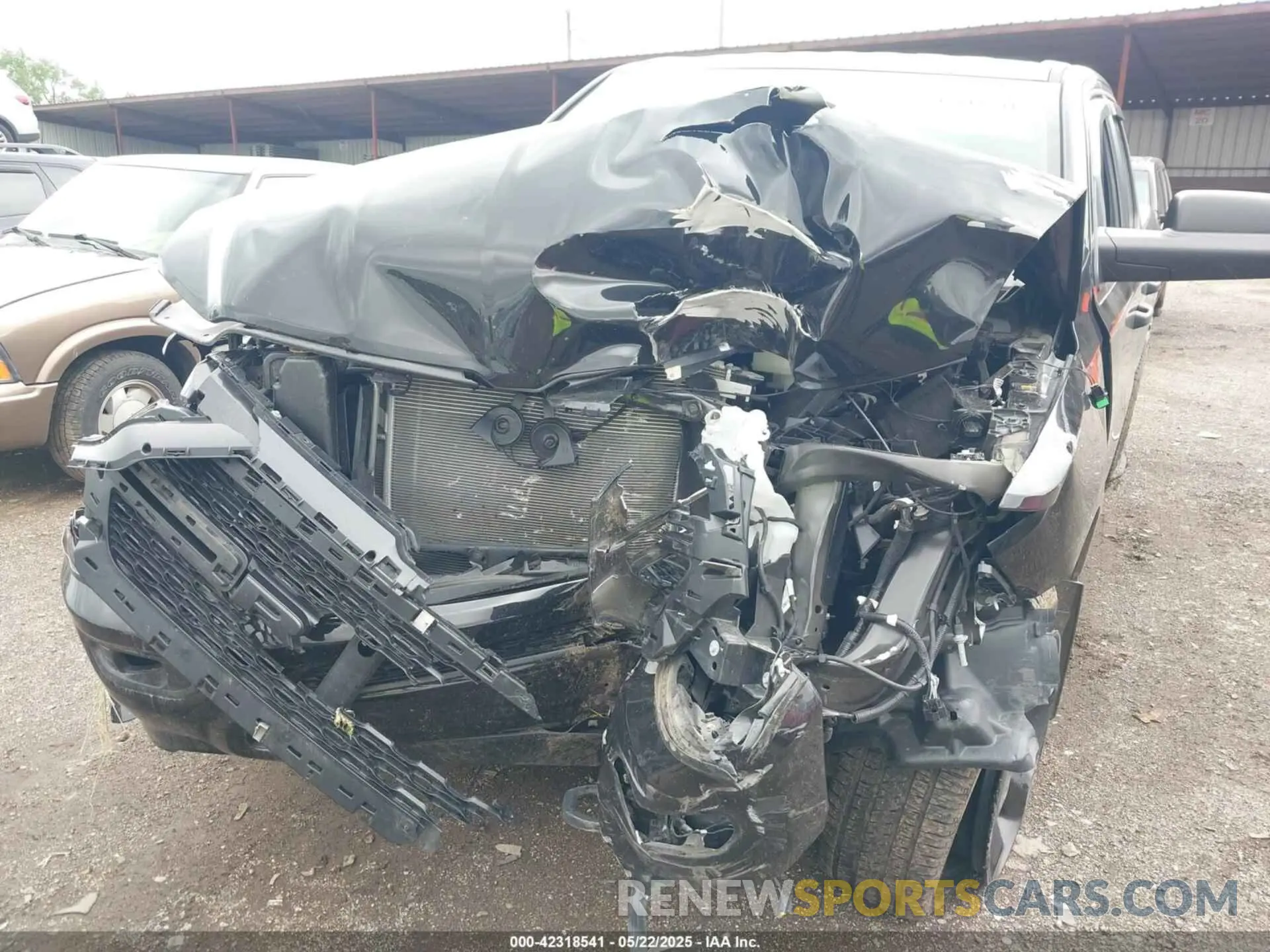 6 Photograph of a damaged car 1C6SRFCT2RN138329 RAM 1500 2024