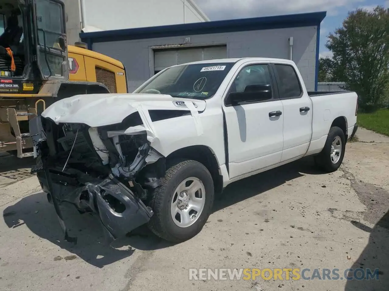 1 Photograph of a damaged car 1C6SRFCT8RN113662 RAM 1500 2024