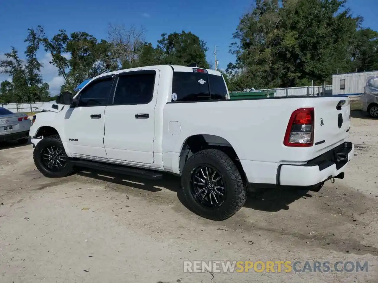 2 Photograph of a damaged car 1C6SRFFT0RN129236 RAM 1500 2024