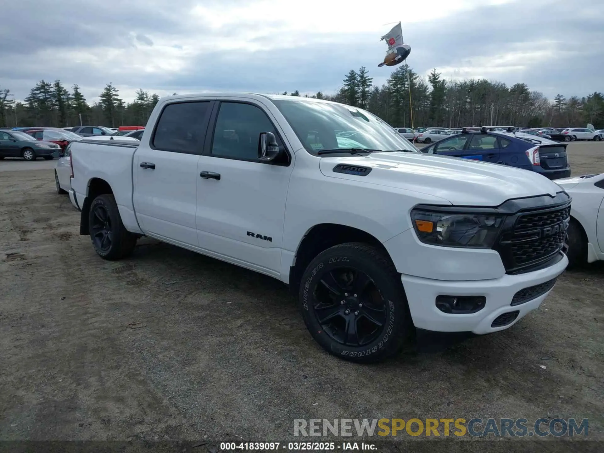 1 Photograph of a damaged car 1C6SRFFT1RN124465 RAM 1500 2024