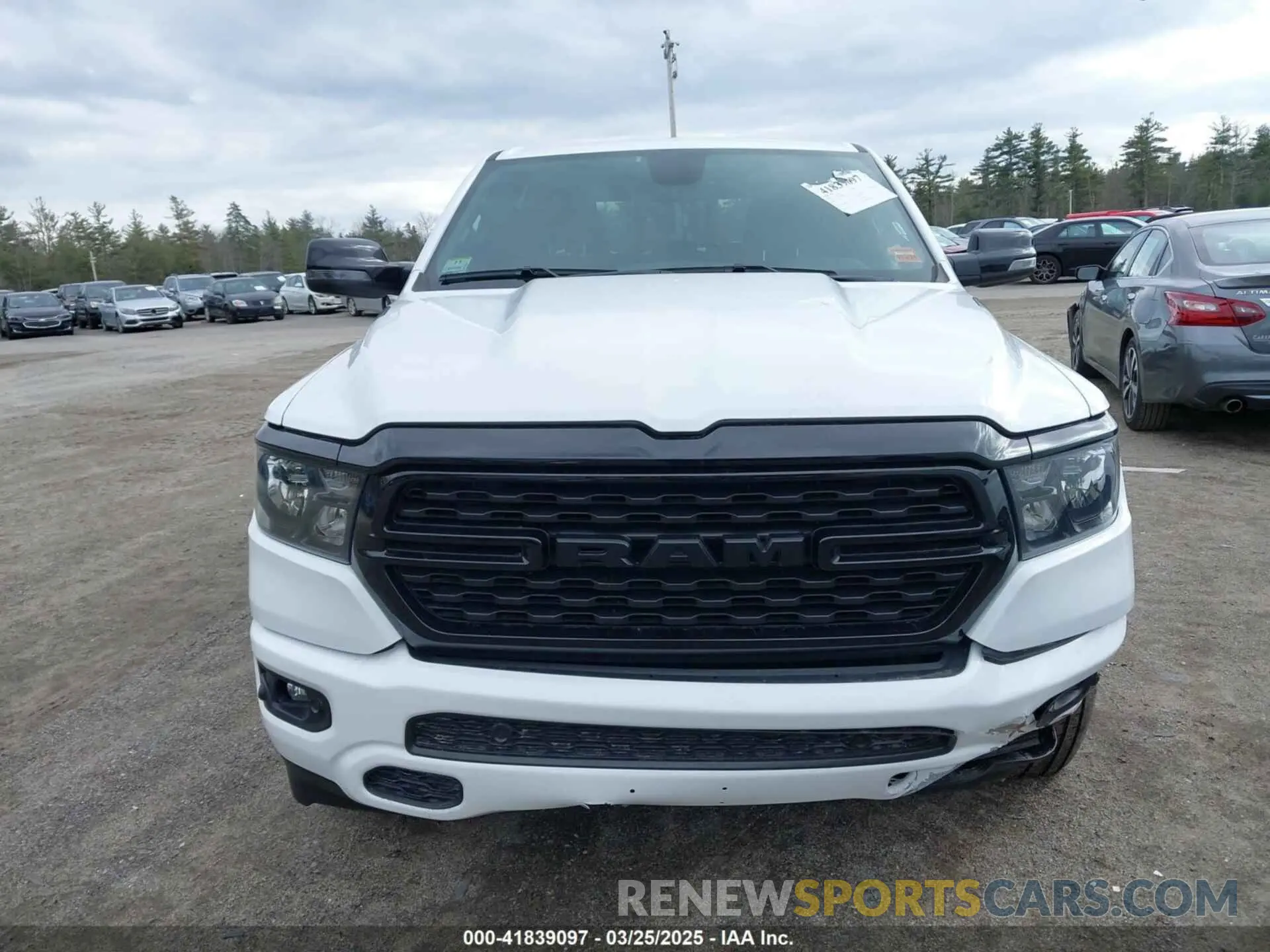 13 Photograph of a damaged car 1C6SRFFT1RN124465 RAM 1500 2024