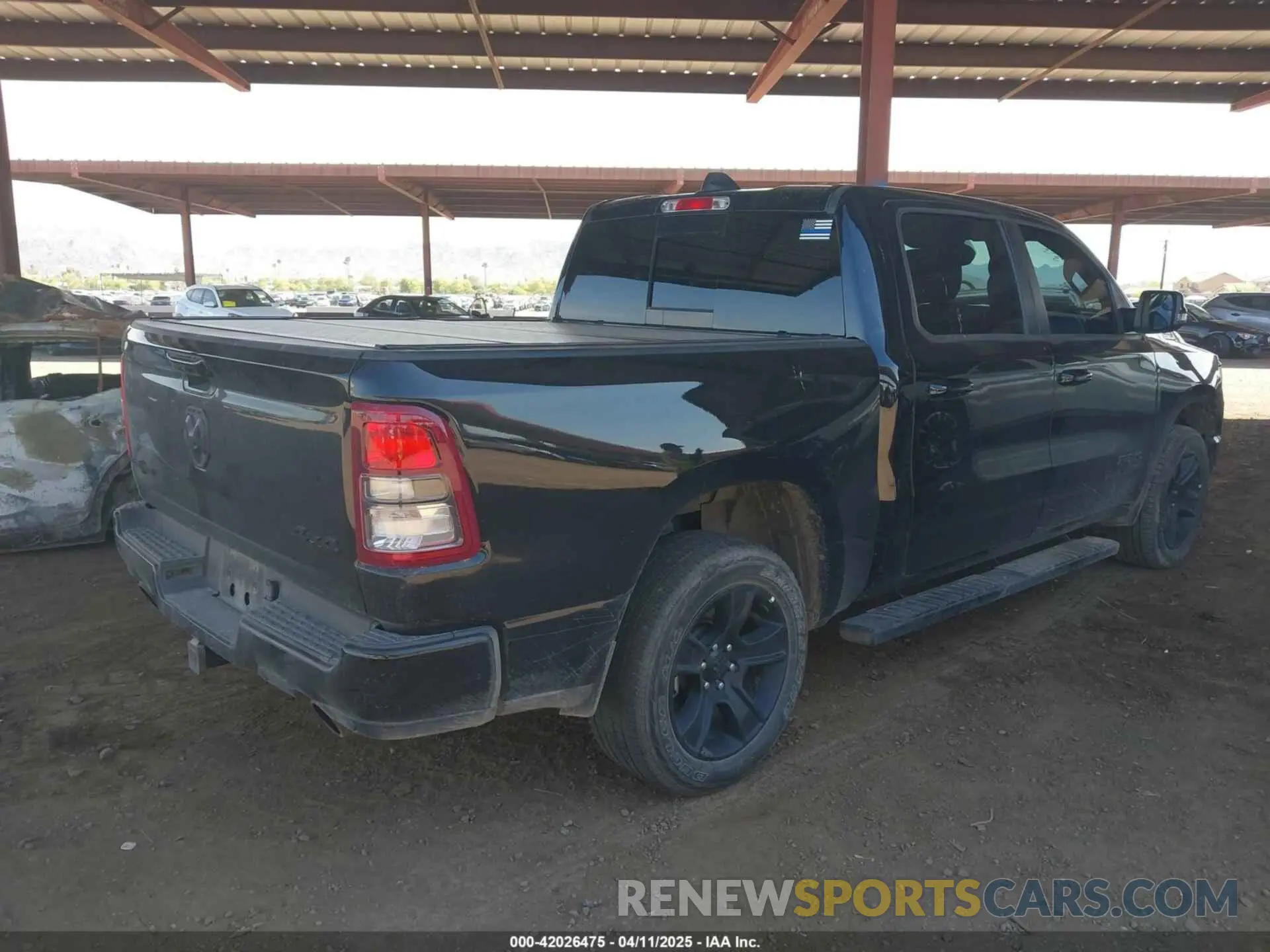 4 Photograph of a damaged car 1C6SRFFT2RN106993 RAM 1500 2024