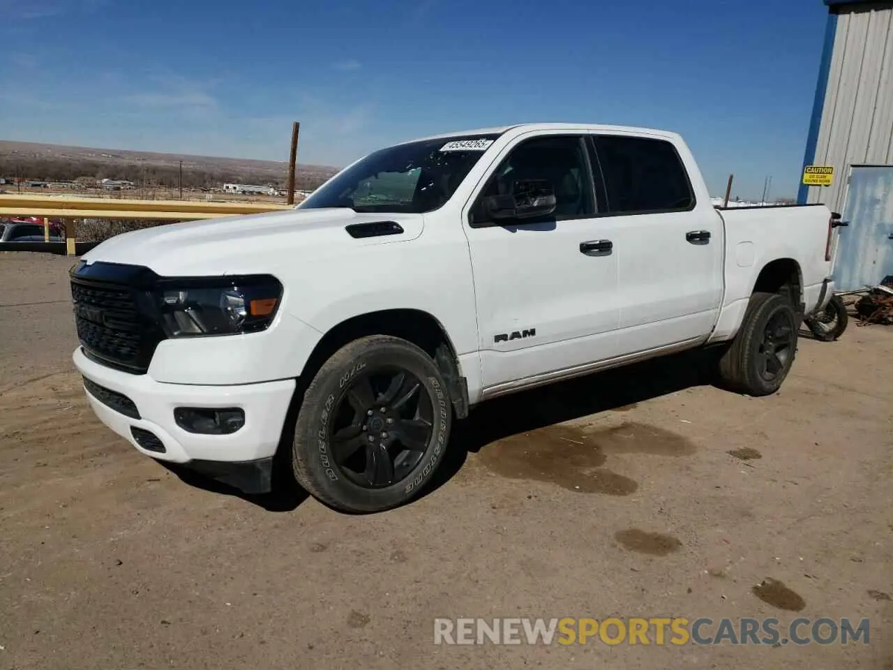 1 Photograph of a damaged car 1C6SRFFT2RN115581 RAM 1500 2024