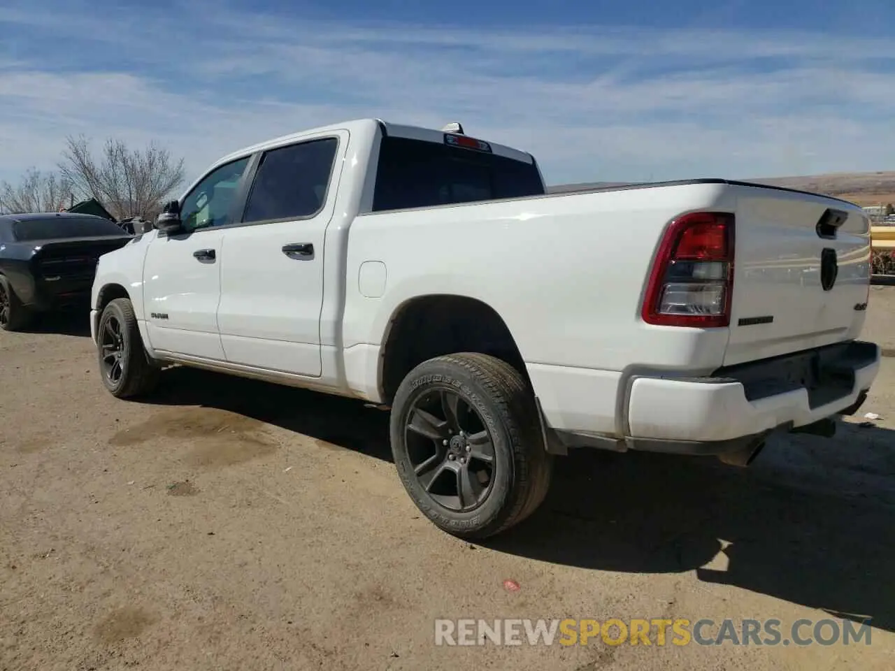 2 Photograph of a damaged car 1C6SRFFT2RN115581 RAM 1500 2024
