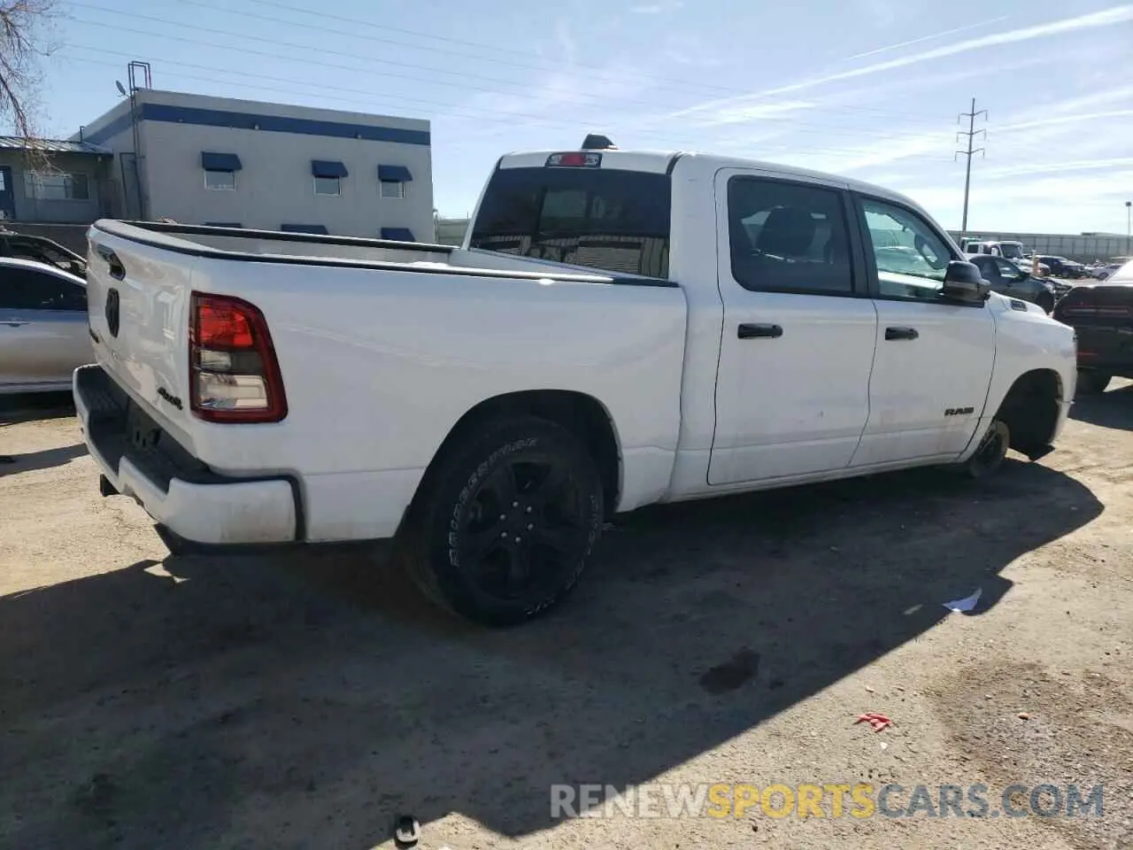 3 Photograph of a damaged car 1C6SRFFT2RN115581 RAM 1500 2024