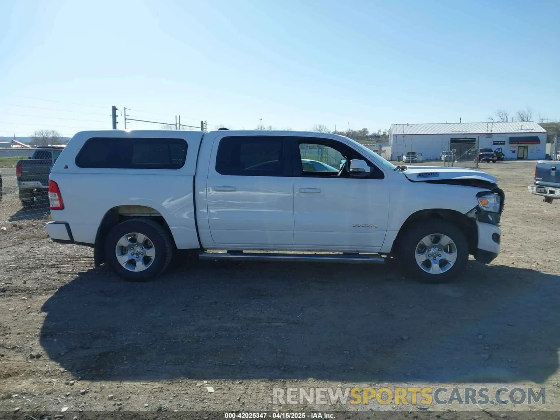 13 Photograph of a damaged car 1C6SRFFT2RN119324 RAM 1500 2024