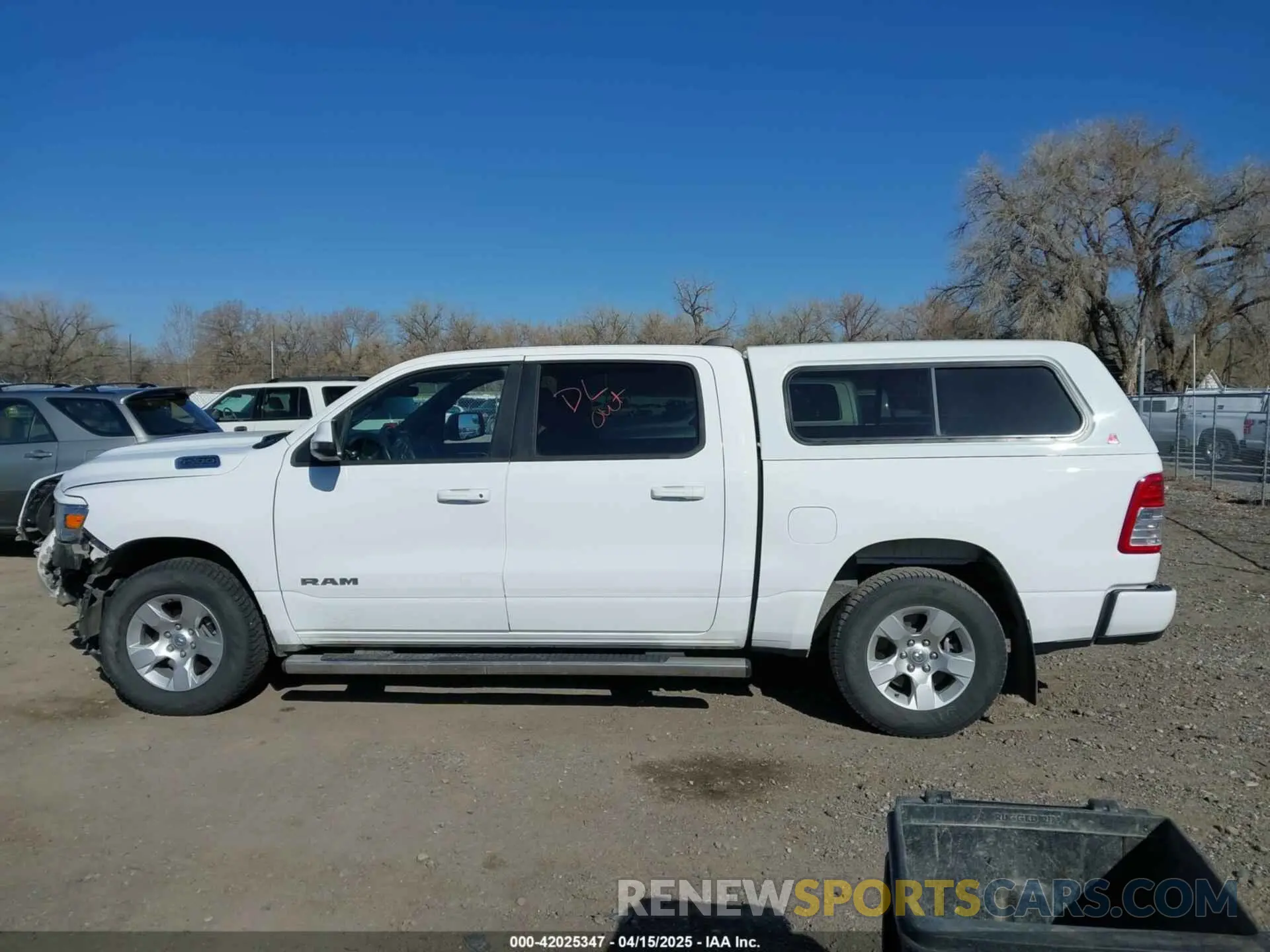 14 Photograph of a damaged car 1C6SRFFT2RN119324 RAM 1500 2024
