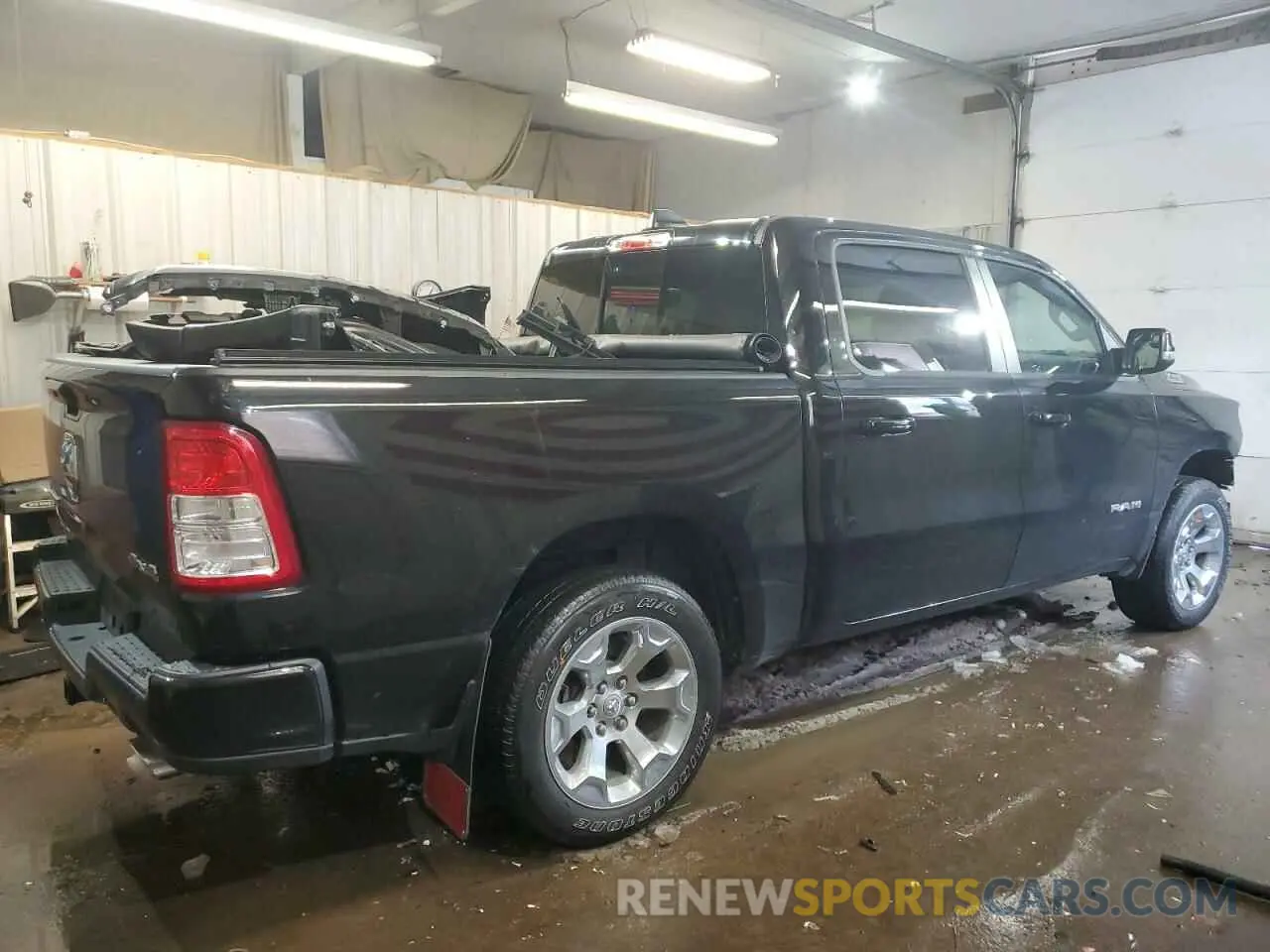 3 Photograph of a damaged car 1C6SRFFT3RN105058 RAM 1500 2024