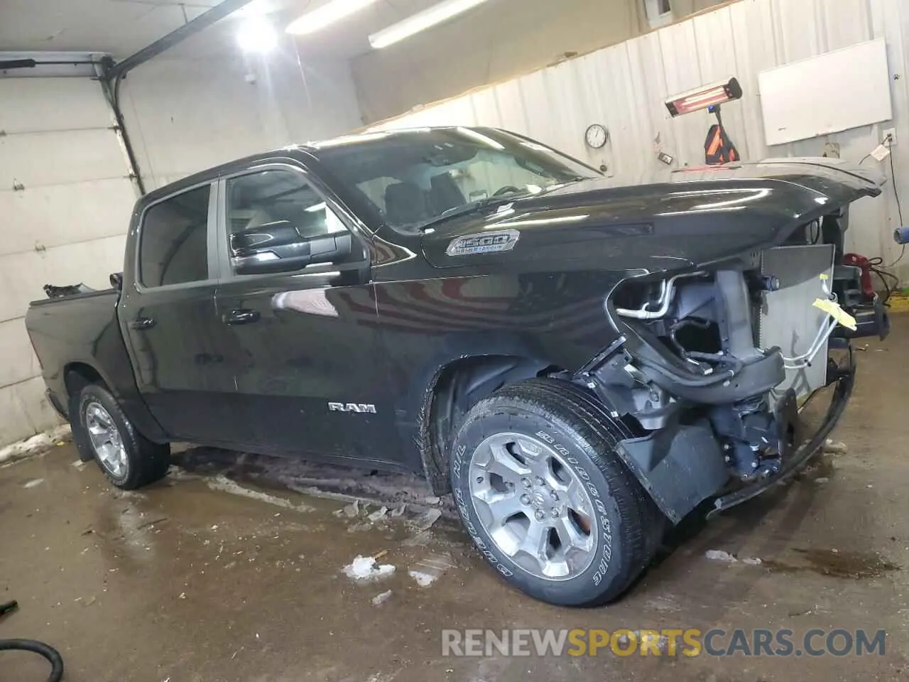 4 Photograph of a damaged car 1C6SRFFT3RN105058 RAM 1500 2024