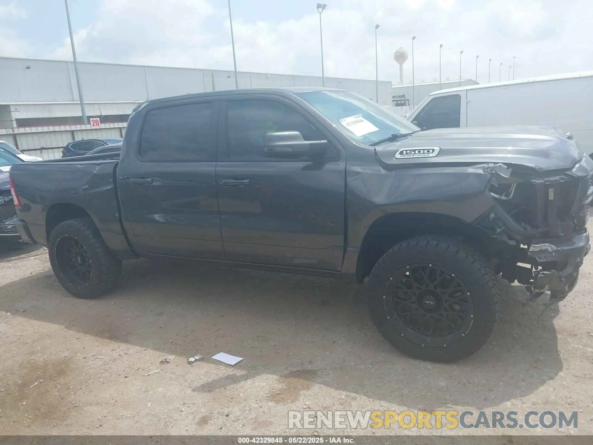 13 Photograph of a damaged car 1C6SRFFT5RN184572 RAM 1500 2024