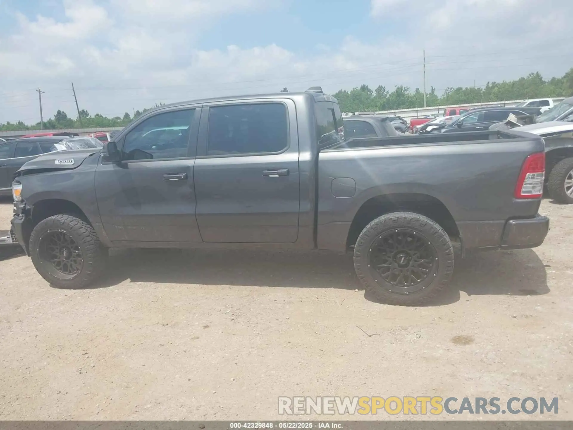 14 Photograph of a damaged car 1C6SRFFT5RN184572 RAM 1500 2024