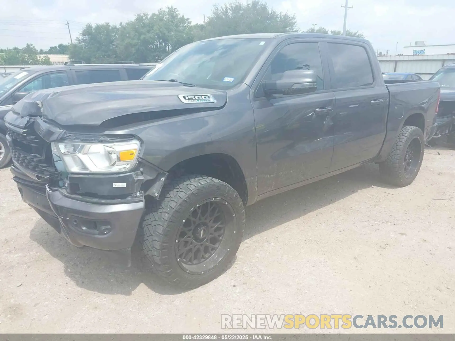 2 Photograph of a damaged car 1C6SRFFT5RN184572 RAM 1500 2024