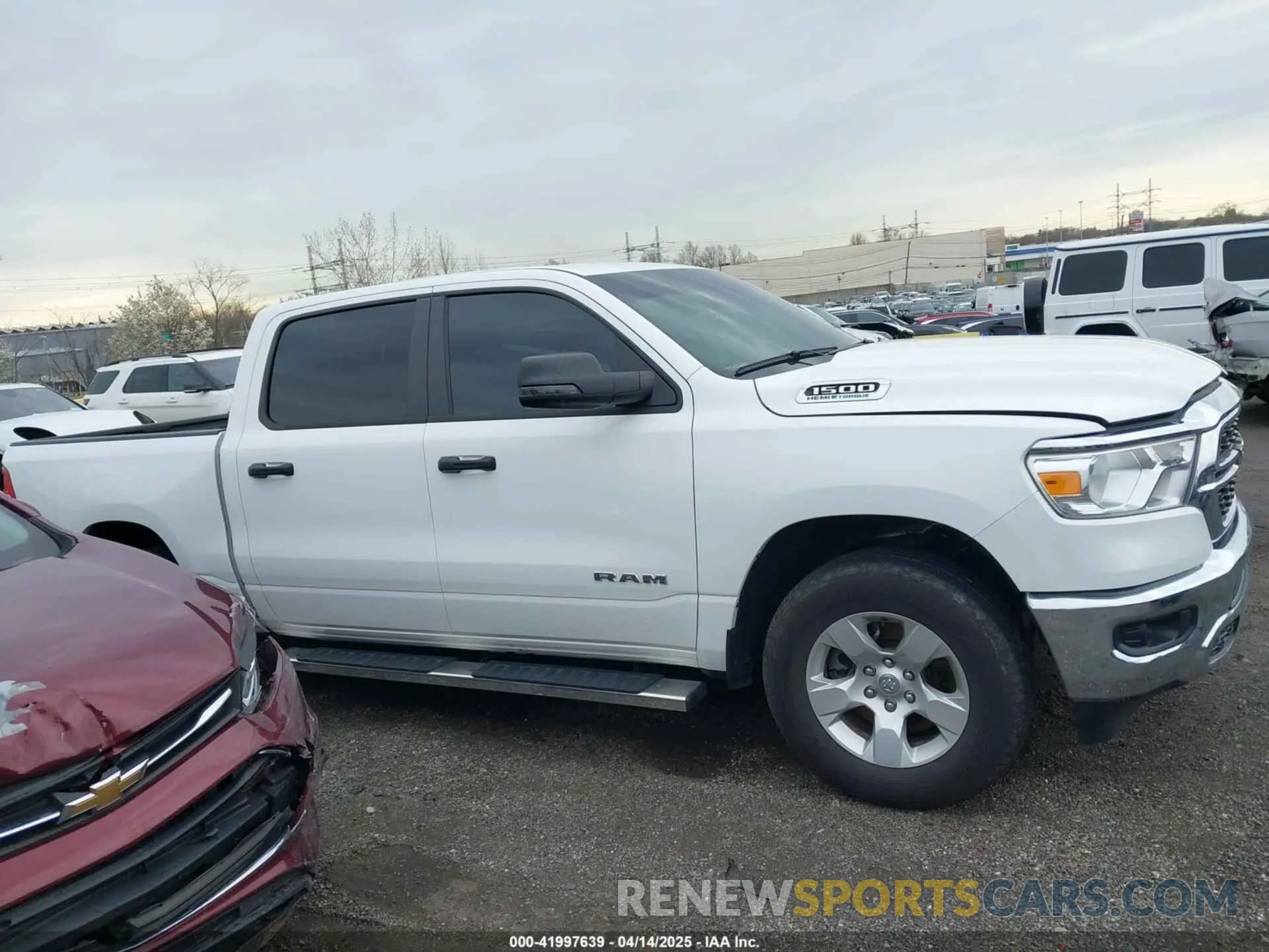 14 Photograph of a damaged car 1C6SRFFT6RN115065 RAM 1500 2024
