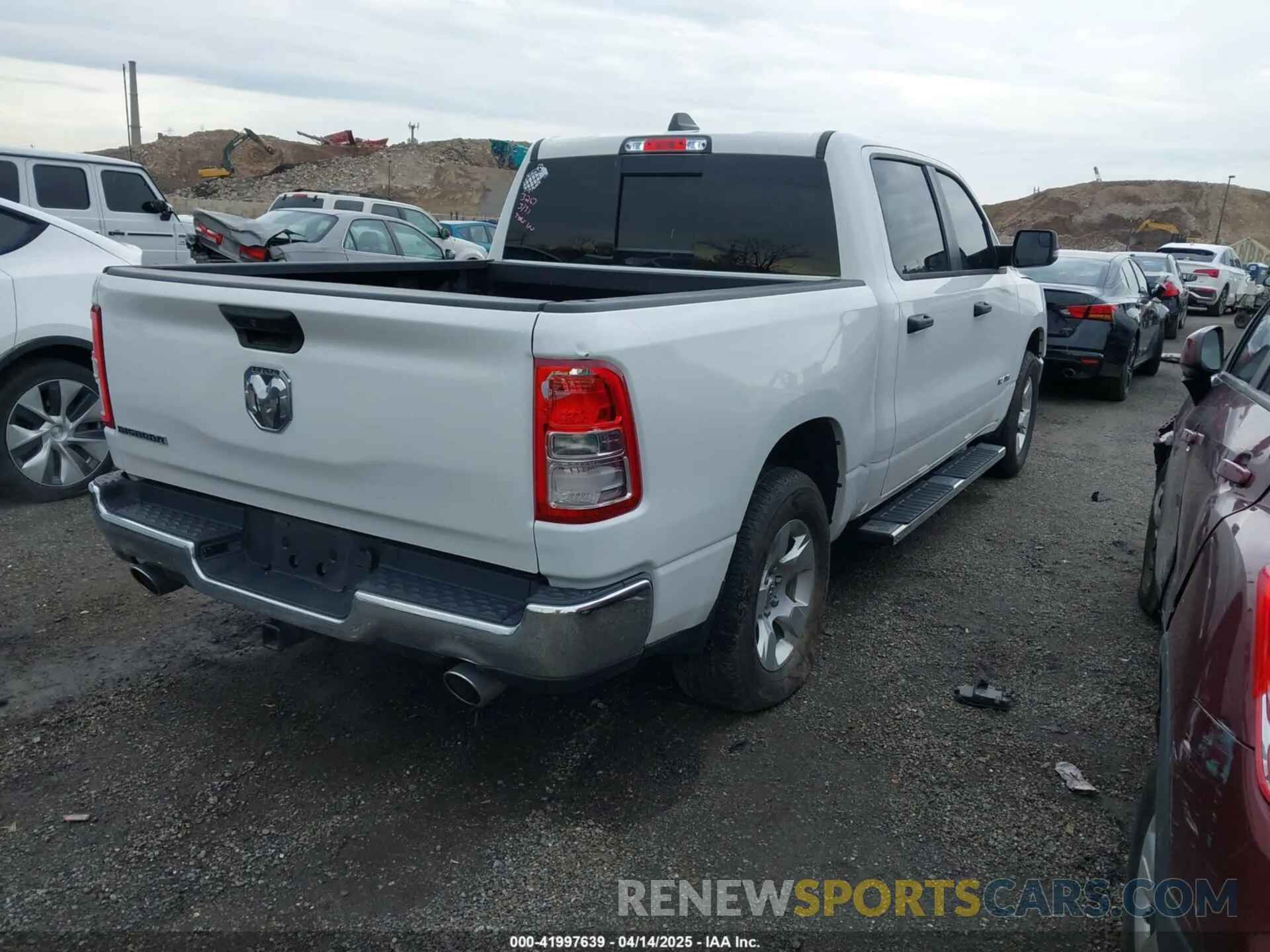 4 Photograph of a damaged car 1C6SRFFT6RN115065 RAM 1500 2024