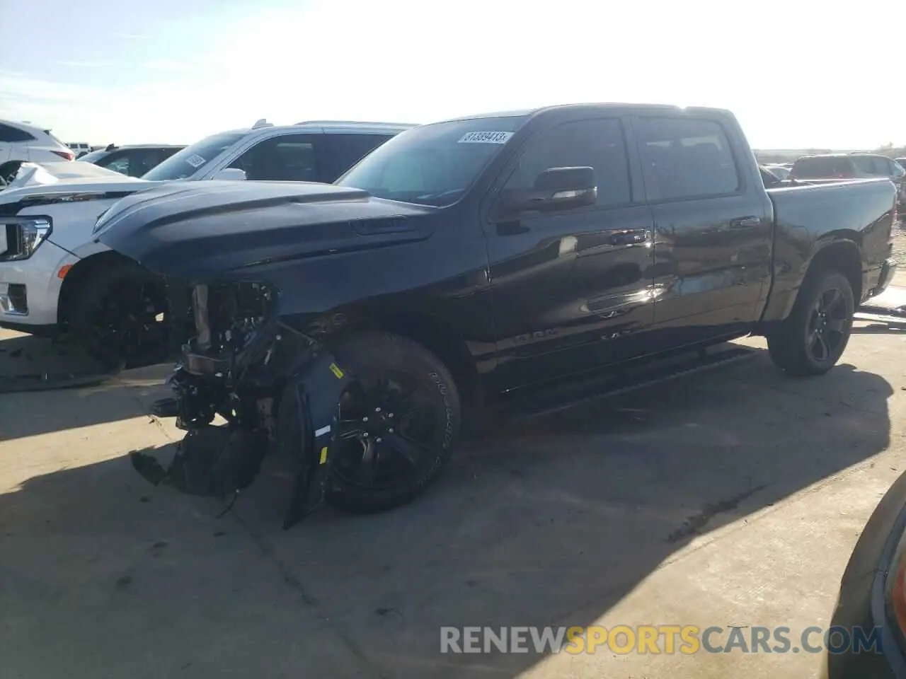 1 Photograph of a damaged car 1C6SRFFT7RN144882 RAM 1500 2024