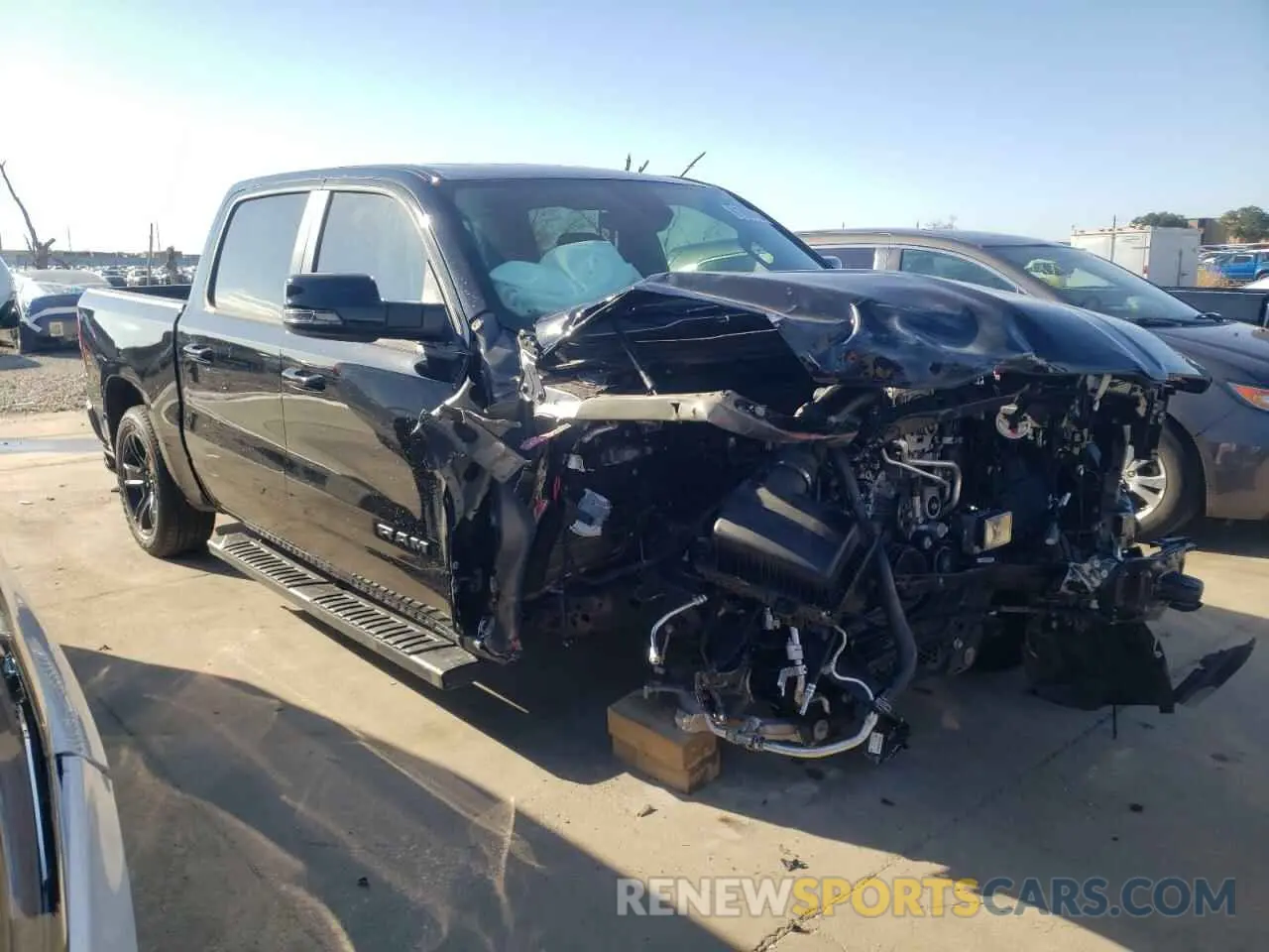 4 Photograph of a damaged car 1C6SRFFT7RN144882 RAM 1500 2024