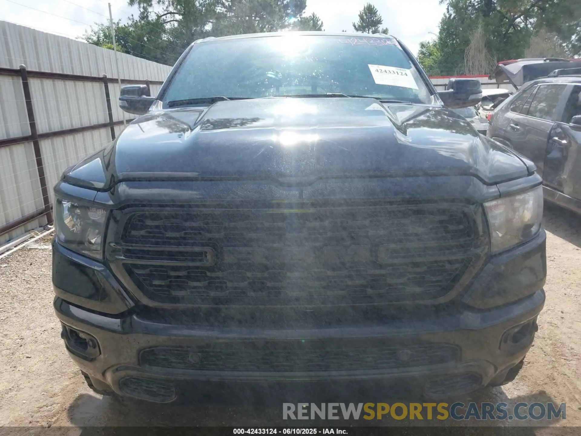 12 Photograph of a damaged car 1C6SRFFT7RN206975 RAM 1500 2024