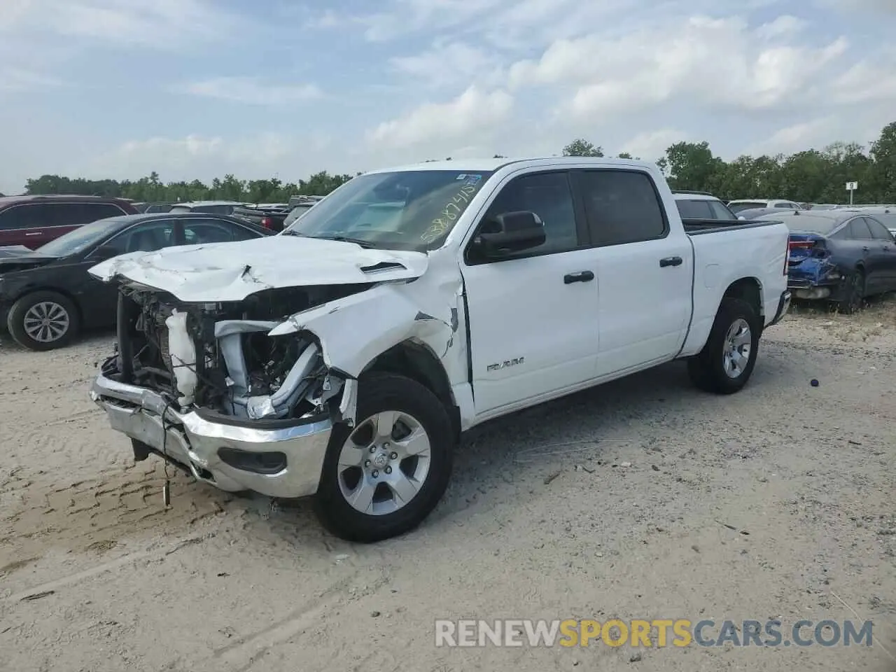 1 Photograph of a damaged car 1C6SRFFT8RN158130 RAM 1500 2024