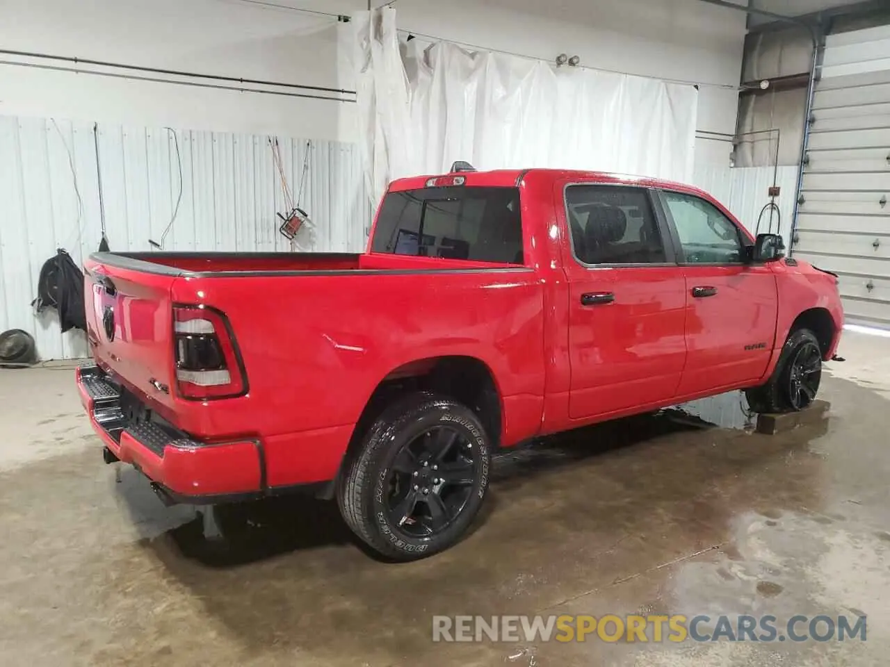 3 Photograph of a damaged car 1C6SRFFT9RN211126 RAM 1500 2024