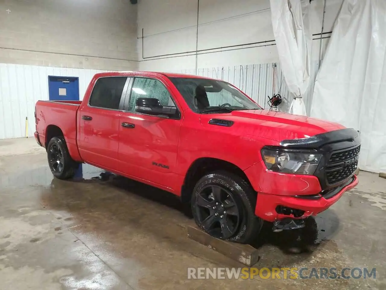 4 Photograph of a damaged car 1C6SRFFT9RN211126 RAM 1500 2024