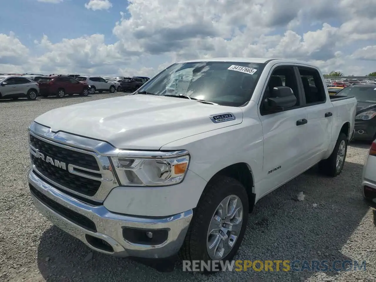 1 Photograph of a damaged car 1C6SRFFTXRN163880 RAM 1500 2024