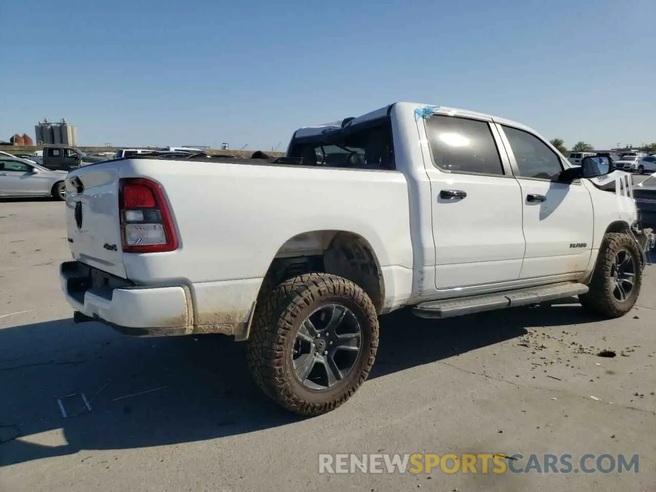 3 Photograph of a damaged car 1C6SRFFTXRN211250 RAM 1500 2024
