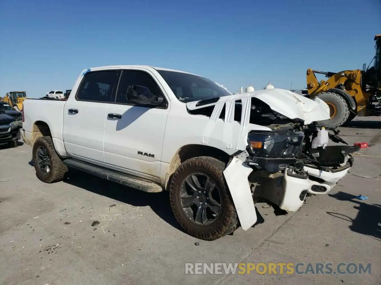 4 Photograph of a damaged car 1C6SRFFTXRN211250 RAM 1500 2024