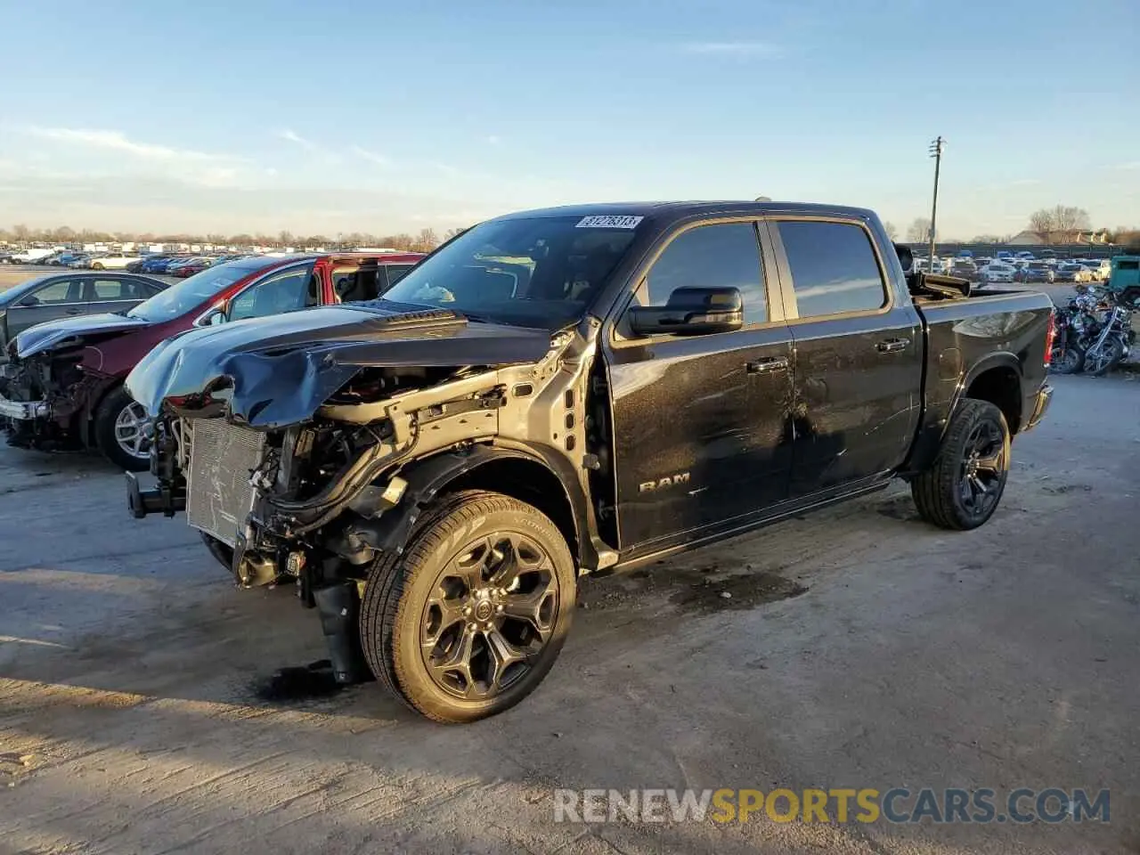 1 Photograph of a damaged car 1C6SRFHT0RN116015 RAM 1500 2024