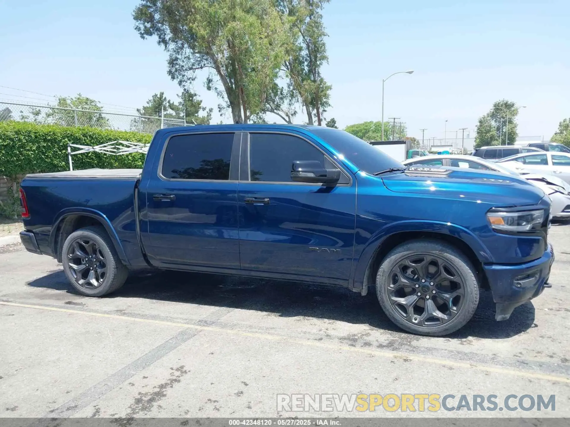 13 Photograph of a damaged car 1C6SRFHT0RN162816 RAM 1500 2024