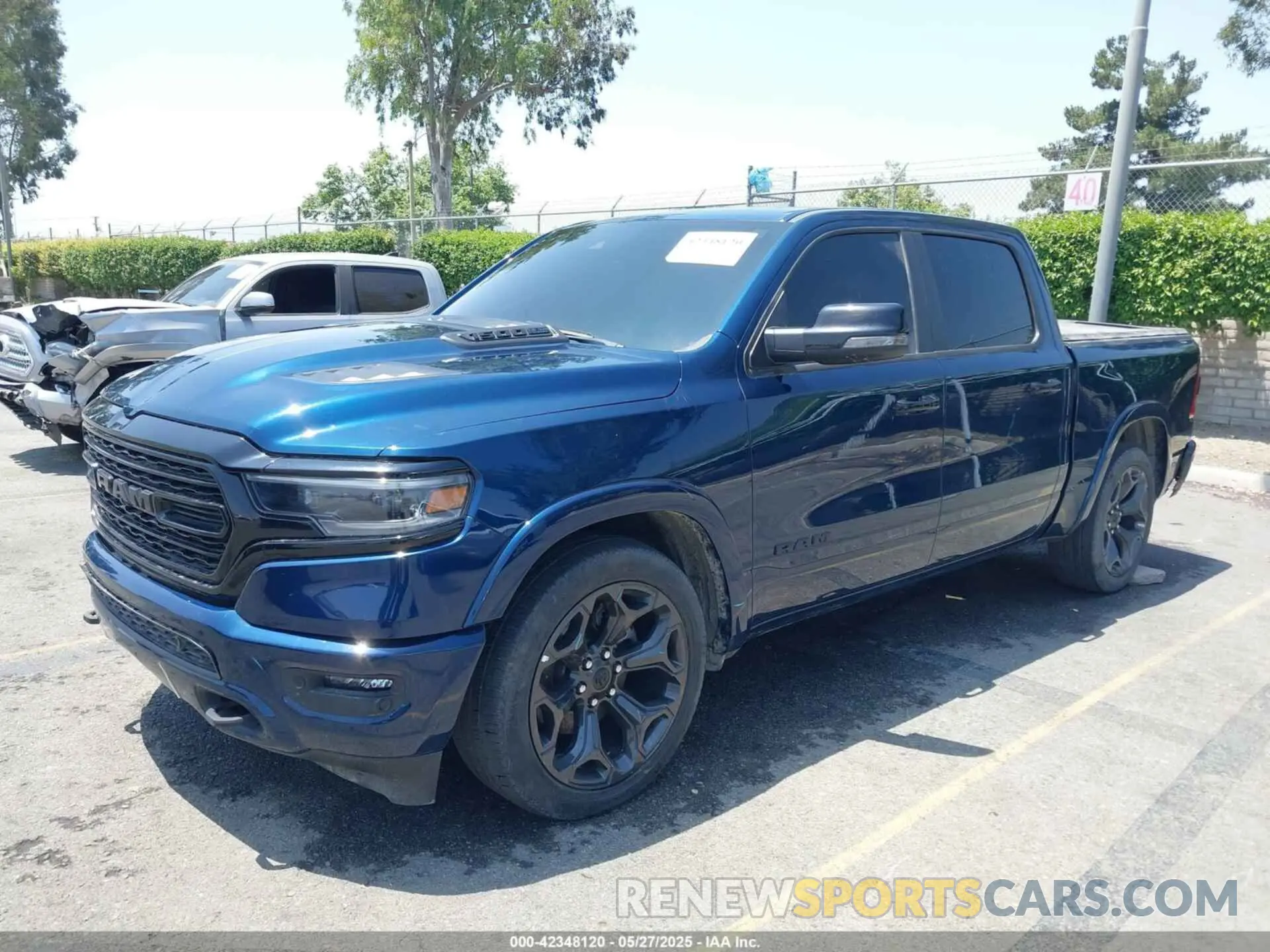 2 Photograph of a damaged car 1C6SRFHT0RN162816 RAM 1500 2024