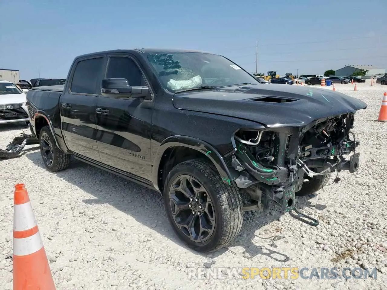 4 Photograph of a damaged car 1C6SRFHT1RN121823 RAM 1500 2024