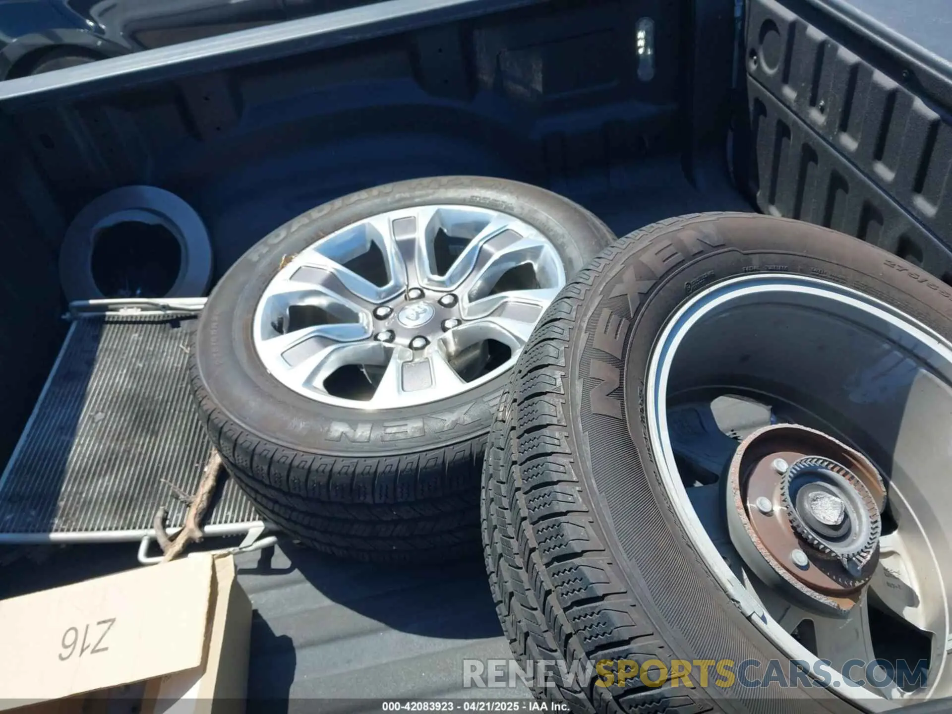 12 Photograph of a damaged car 1C6SRFHT1RN209318 RAM 1500 2024