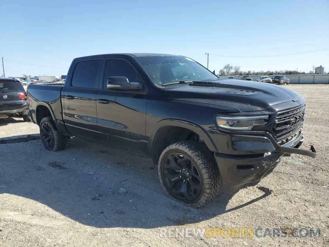 4 Photograph of a damaged car 1C6SRFHT5RN227711 RAM 1500 2024