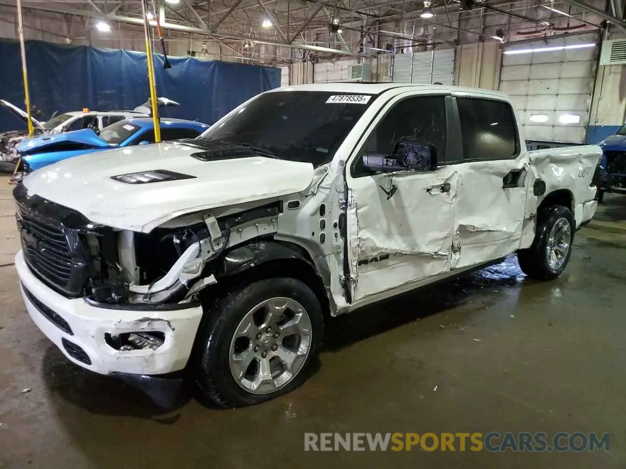 1 Photograph of a damaged car 1C6SRFJT0RN121404 RAM 1500 2024
