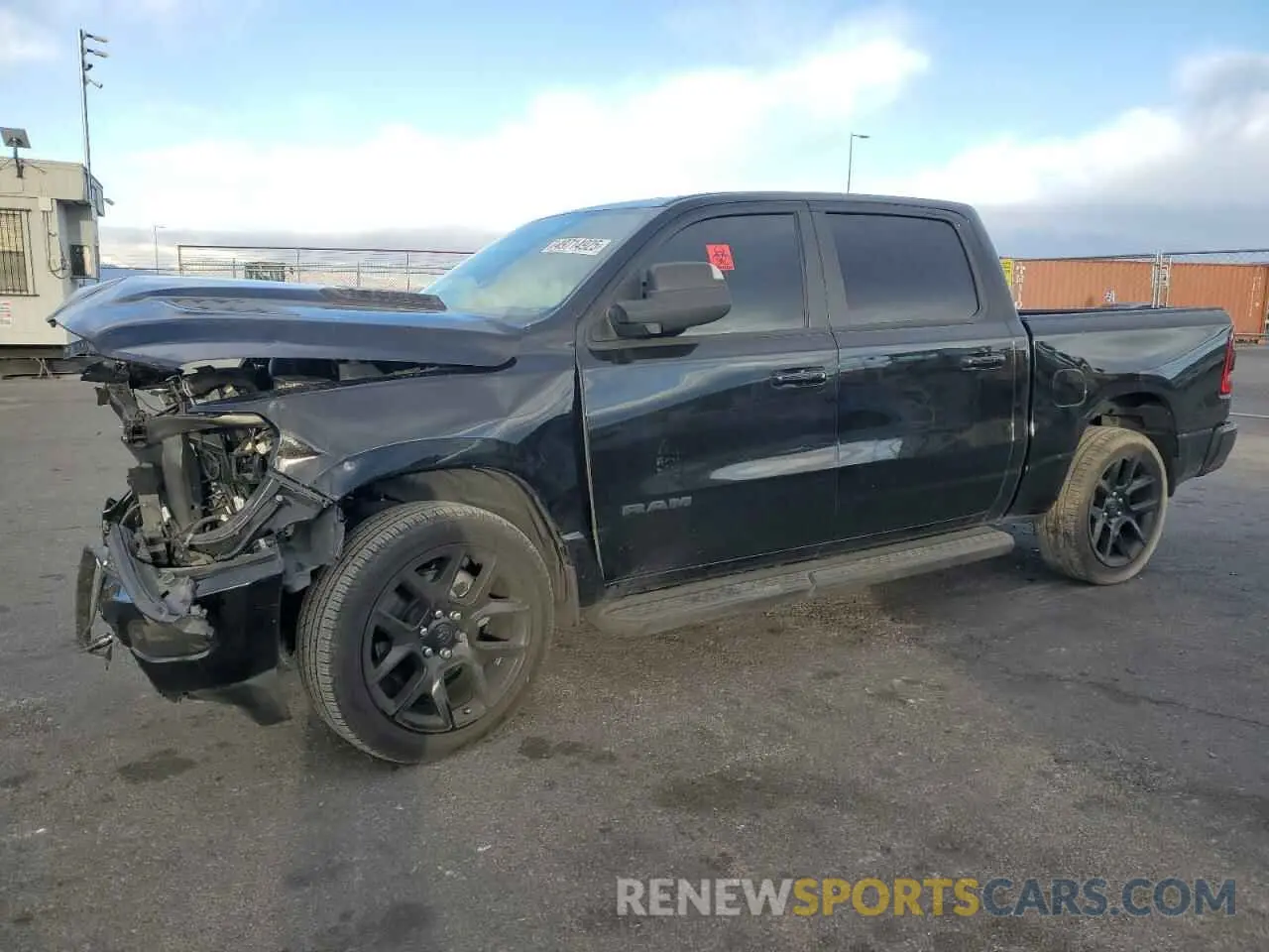 1 Photograph of a damaged car 1C6SRFJT1RN116051 RAM 1500 2024