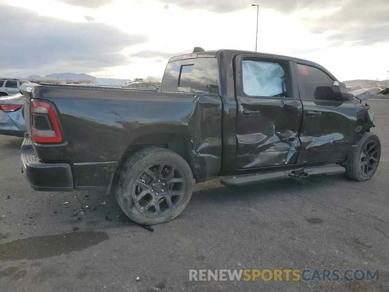 3 Photograph of a damaged car 1C6SRFJT1RN116051 RAM 1500 2024
