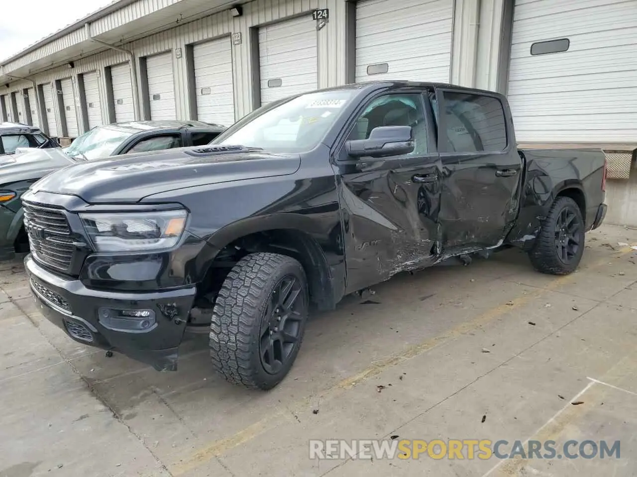 1 Photograph of a damaged car 1C6SRFJT1RN116583 RAM 1500 2024
