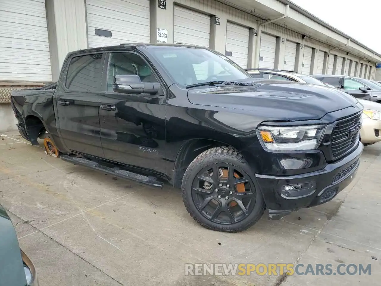 4 Photograph of a damaged car 1C6SRFJT1RN116583 RAM 1500 2024