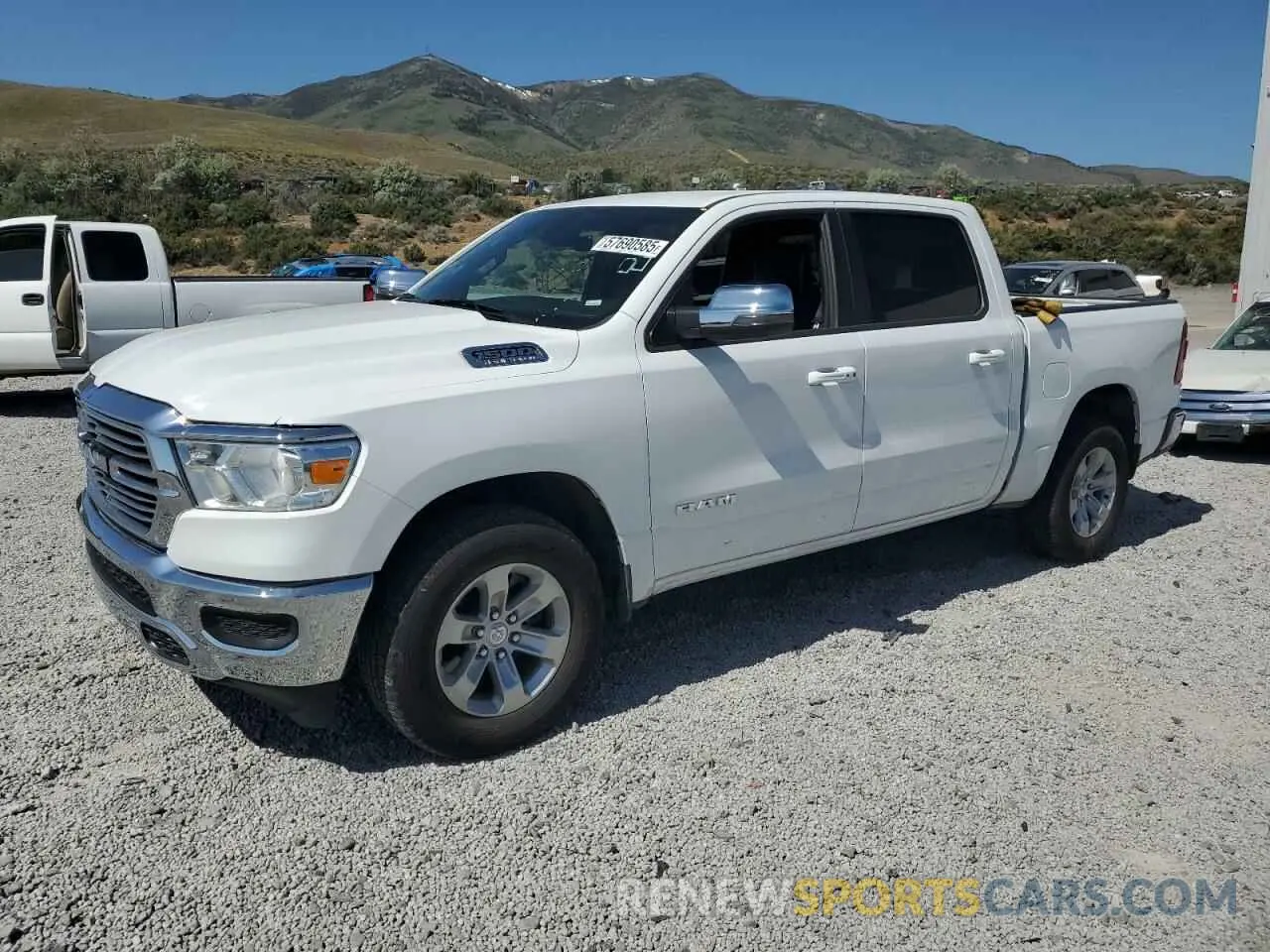 1 Photograph of a damaged car 1C6SRFJT1RN215386 RAM 1500 2024