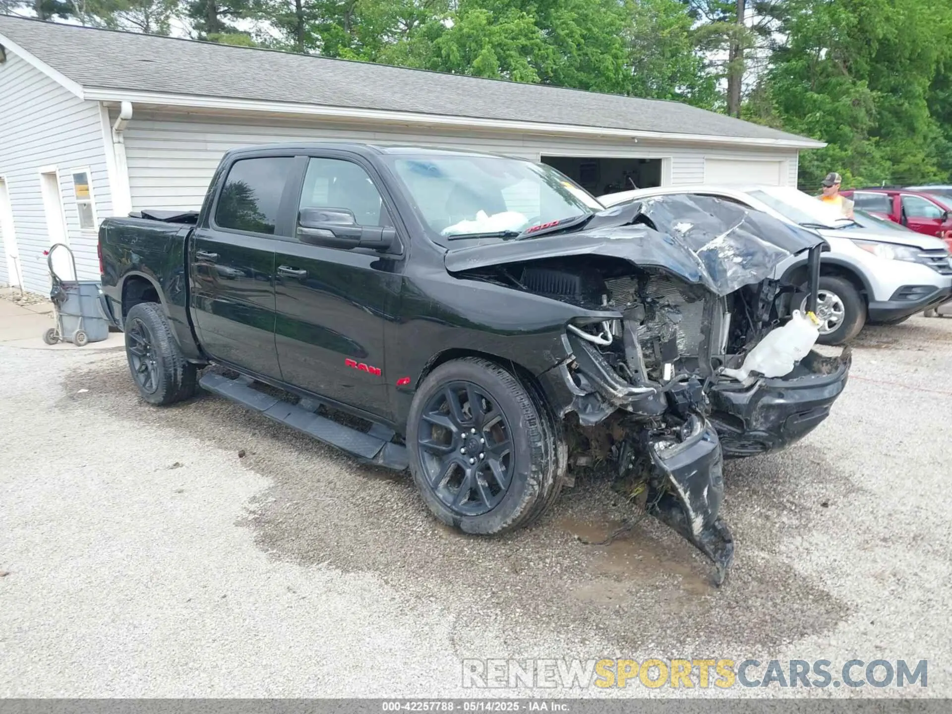 1 Photograph of a damaged car 1C6SRFJT2RN105561 RAM 1500 2024