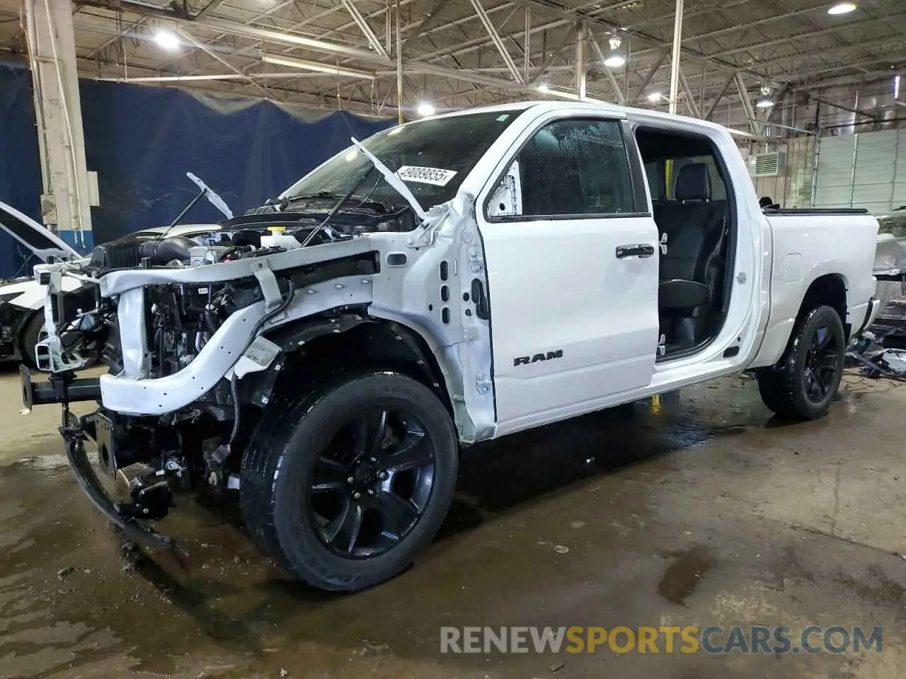 1 Photograph of a damaged car 1C6SRFJT2RN136325 RAM 1500 2024