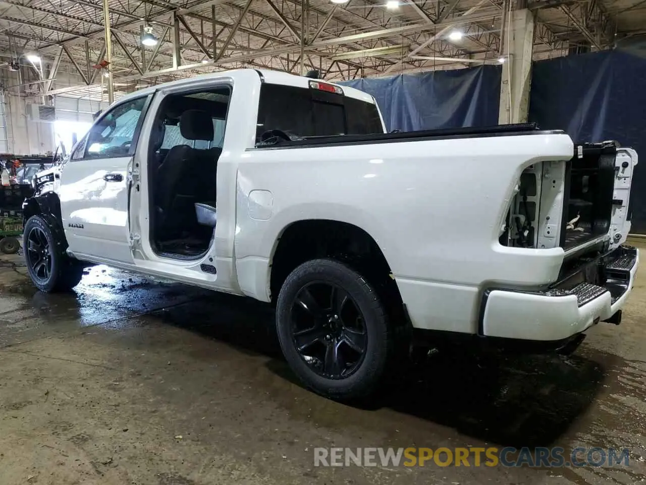 2 Photograph of a damaged car 1C6SRFJT2RN136325 RAM 1500 2024