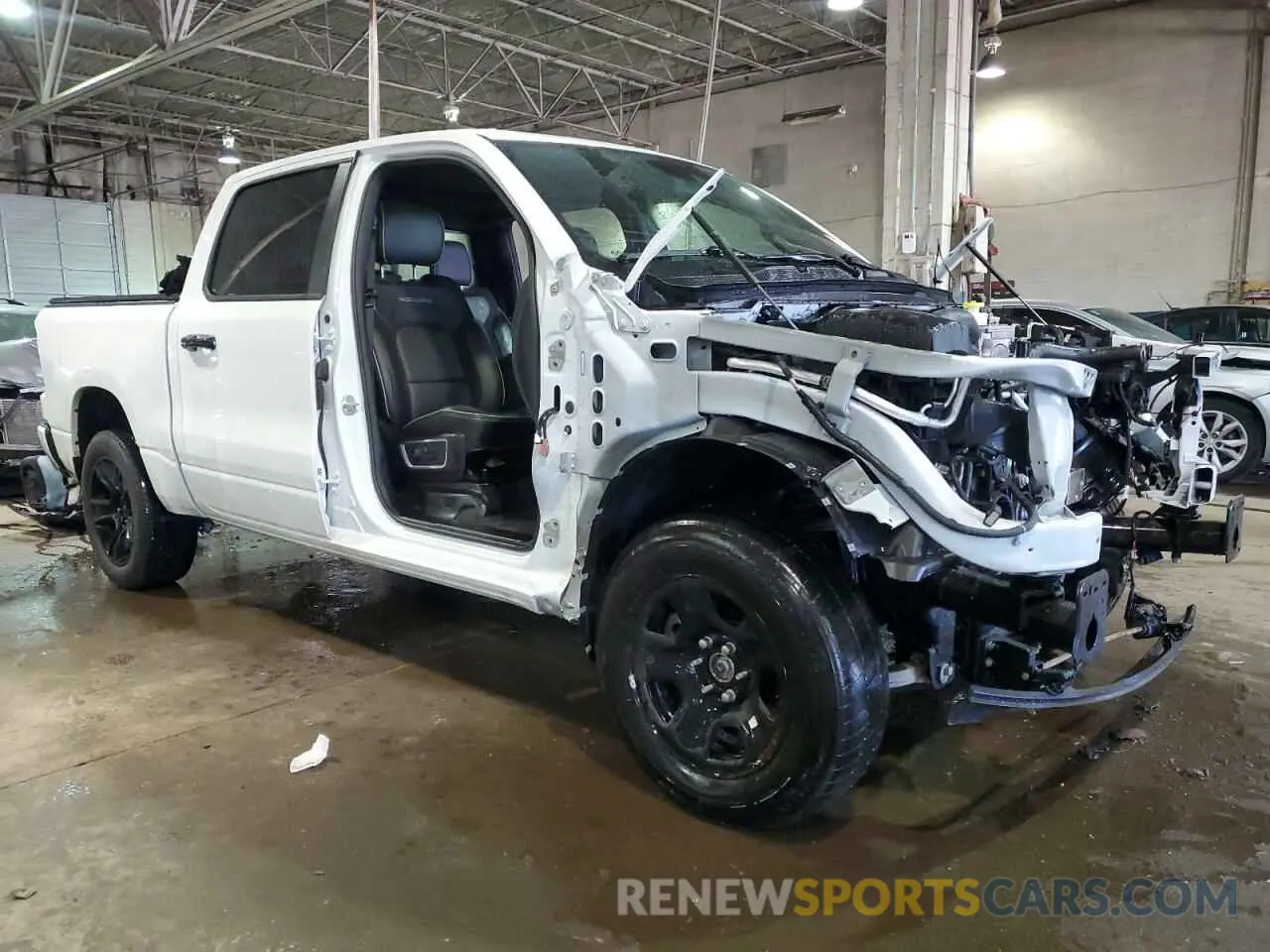 4 Photograph of a damaged car 1C6SRFJT2RN136325 RAM 1500 2024