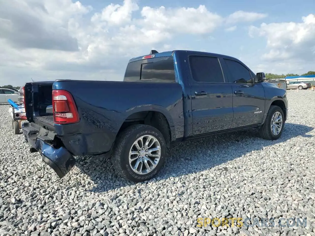 3 Photograph of a damaged car 1C6SRFJT3RN118318 RAM 1500 2024