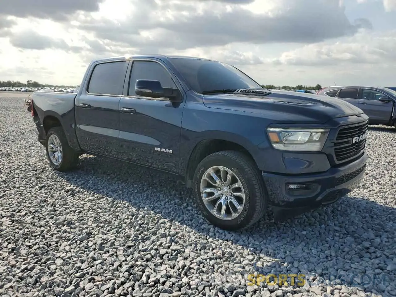 4 Photograph of a damaged car 1C6SRFJT3RN118318 RAM 1500 2024