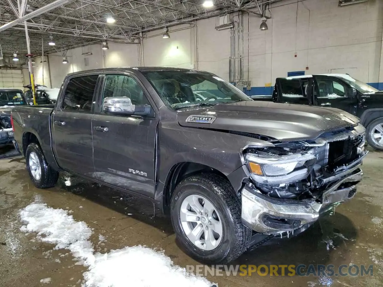 4 Photograph of a damaged car 1C6SRFJT4RN105139 RAM 1500 2024